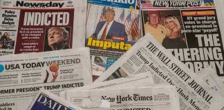 Newspaper headlines about Trumps indictment.