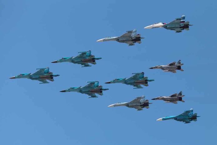 A formation of military jet fighters flying in a clear blue sky