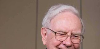 Warren Buffett smiling during a public appearance