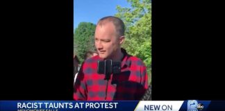 Woman says man called protesters 'uncivilized monkeys'