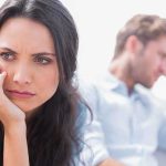 AI-Driven Love: Profit Over Soulmates? A woman looking concerned while a man appears distressed in the background
